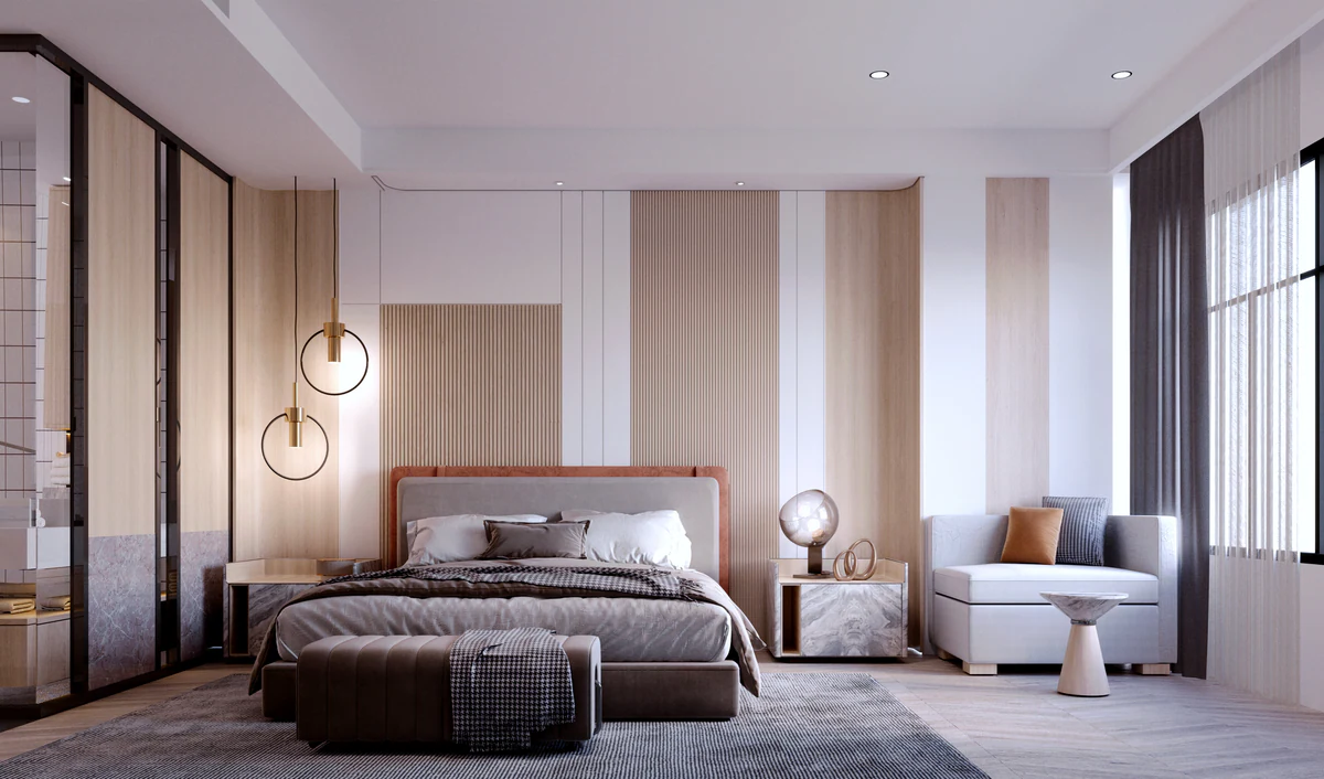 Bedroom in warm tones with luminaires on either side of the bed