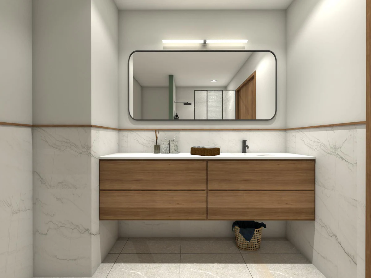 Bathroom with a wooden vanity unit and illuminated mirror above the washbasin