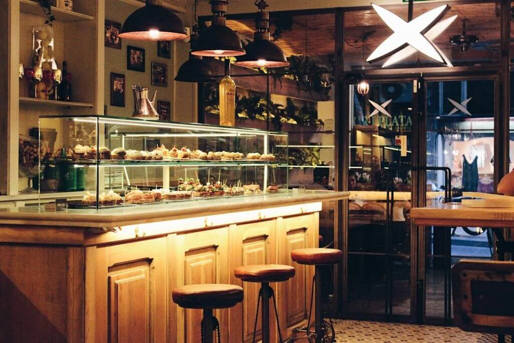 Restaurant bar with pendant lamps and warm lighting